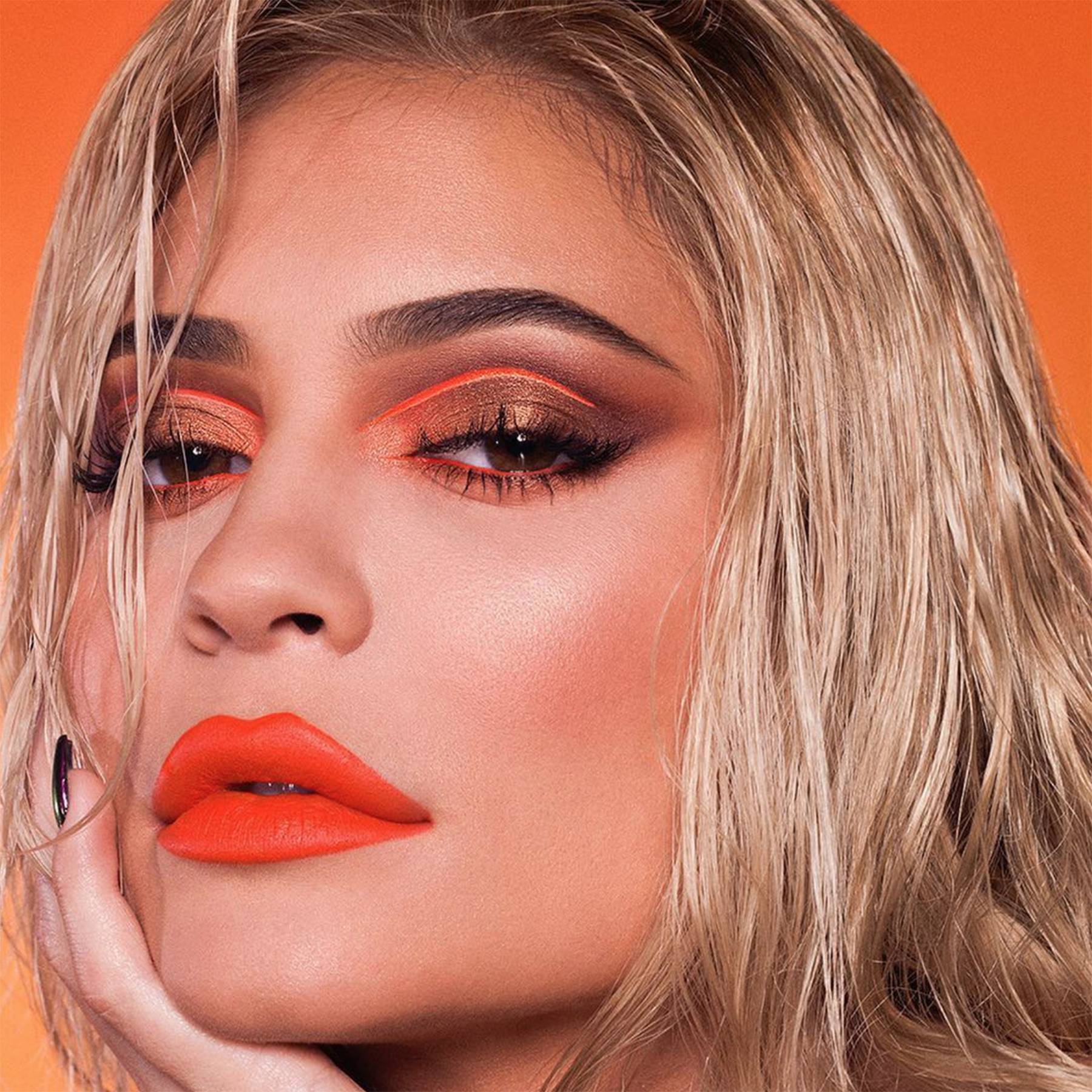 Kylie Jenner with orange floating crease eyeliner